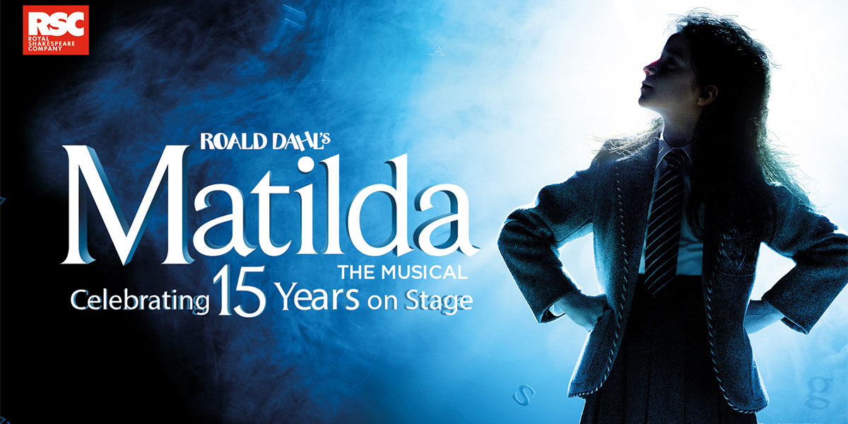 Promotional image for "Matilda The Musical" by the Royal Shakespeare Company, featuring a silhouette of a person against a moody blue background, celebrating 15 years on stage.