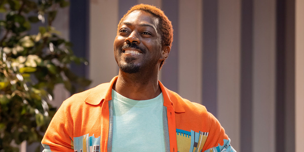 David Ajala smiling, facing forward