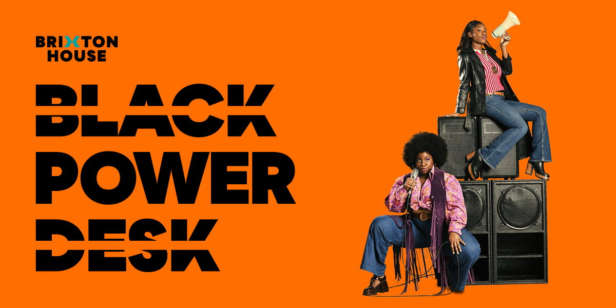 The background is orange. On the left it reads 'Black Power Desk' on the right is an image of two people. The person on the right is sitting on a chair. They are wearing a pink and orange, patterned shirt and flared blue jeans. They are holding a microphone. Just behind the first person is 2 large black speakers which have another 2 black speakers stacked on top of them. On top of the second set of speakers sits another person. They are wearing a red and white, striped shirt, blue jeans and a black leather jacket. They are holding a megaphone.