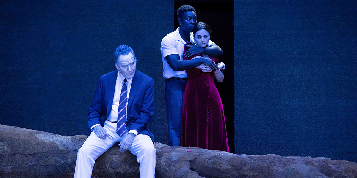 Bryan Cranston as Joe Keller, Paapa Essiedu as Chris Keller, and Hayley Squires as Ann Deever on stage.