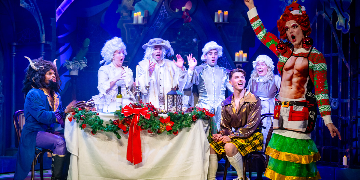 Keanu Adolphus Johnson, Matt Kennedy, and Matthew Baldwin pose together, smiling, in a theatrical setting.