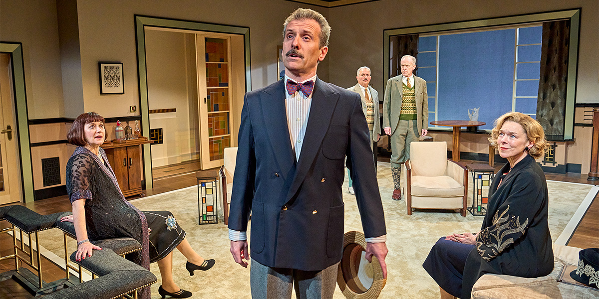 A dramatic scene from "The Company of Fallen Angels," featuring actors in dark costumes against a moody backdrop.