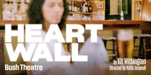 A vibrant heart-shaped wall display featuring various colourful digital assets and textures in a modern setting.