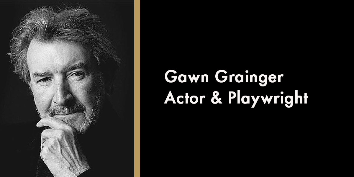 A memorial tribute featuring a portrait of Grainger Gawn, surrounded by flowers and candles.