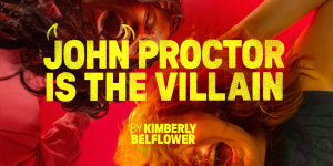 John Proctor stands centre stage, looking distressed, with dramatic lighting highlighting his expression and dark costume.