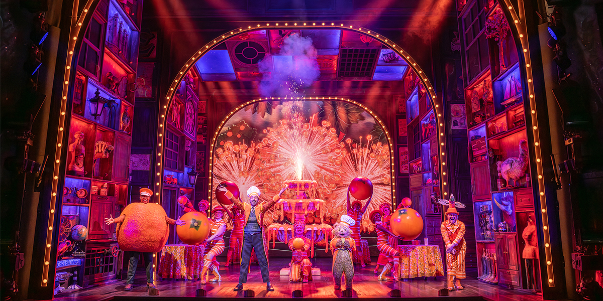 Tom Edden, James Hameed, and Arti Shah pose together, smiling, against a neutral background.