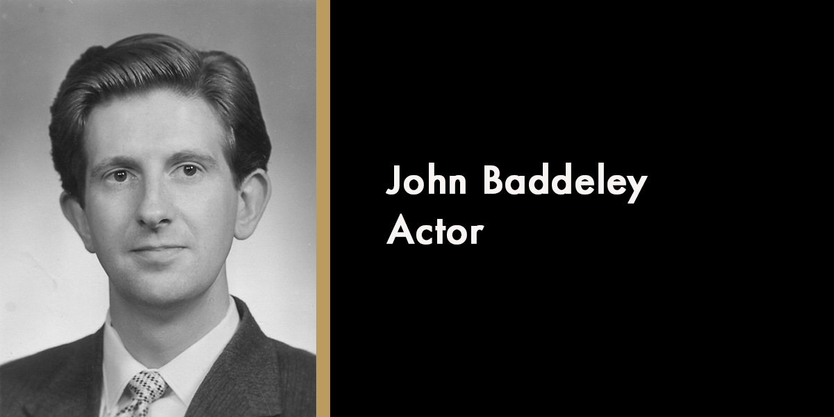 John Baddeley, smiling, wearing a suit, against a neutral background, with a memorial caption below.