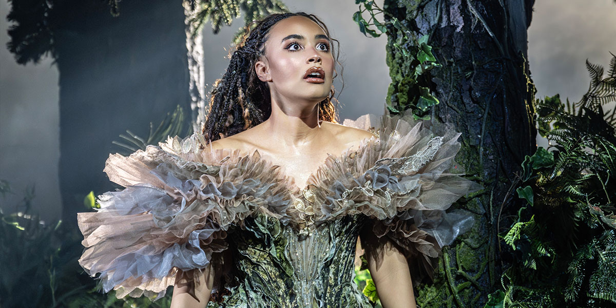 Francesca Lynn showcases an elaborate costume design, featuring intricate textures and vibrant colours, during the event.