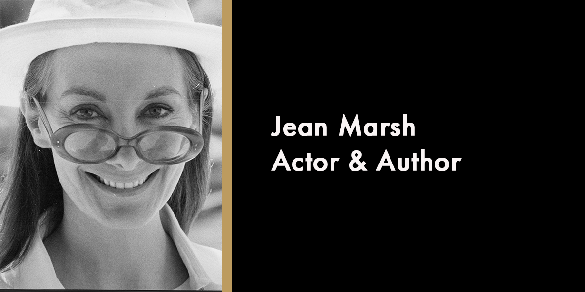 A portrait of Jean Marsh, smiling, with a soft-focus background, commemorating her in memoriam 2026.