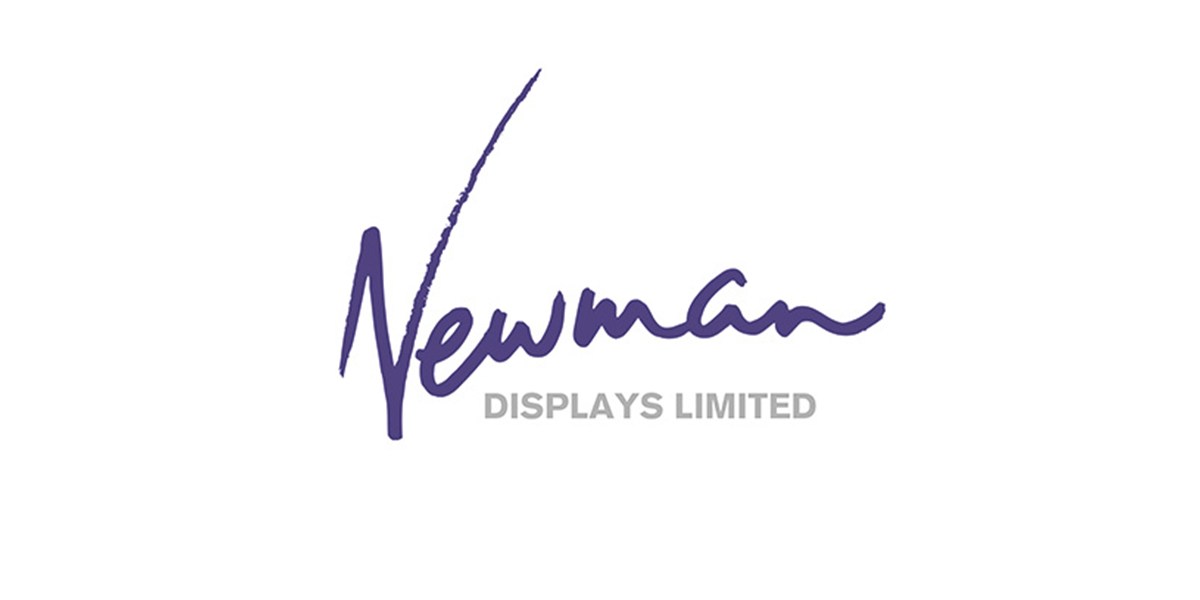 A group of elegantly dressed individuals poses together, smiling, with a backdrop featuring the Olivier Awards logo.