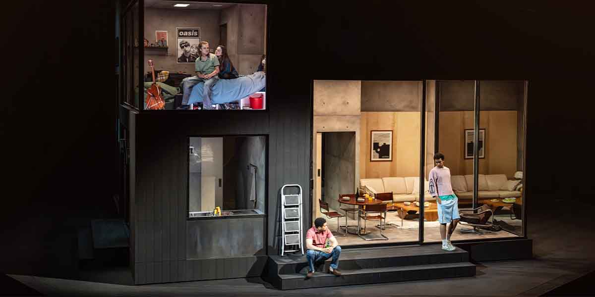 Tom Glynn-Carney and Rosie Sheehy sit on a bed, while John Macmillan and Archie Madekwe stand nearby.