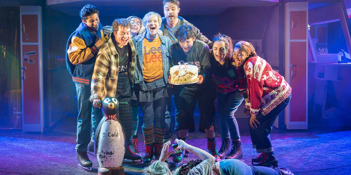 Maria Friedman stands at the centre, surrounded by the cast of Kimberly Akimbo, all smiling.