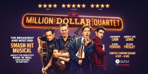 A lively scene from "Million Dollar Quartet" featuring four musicians performing on stage with instruments.